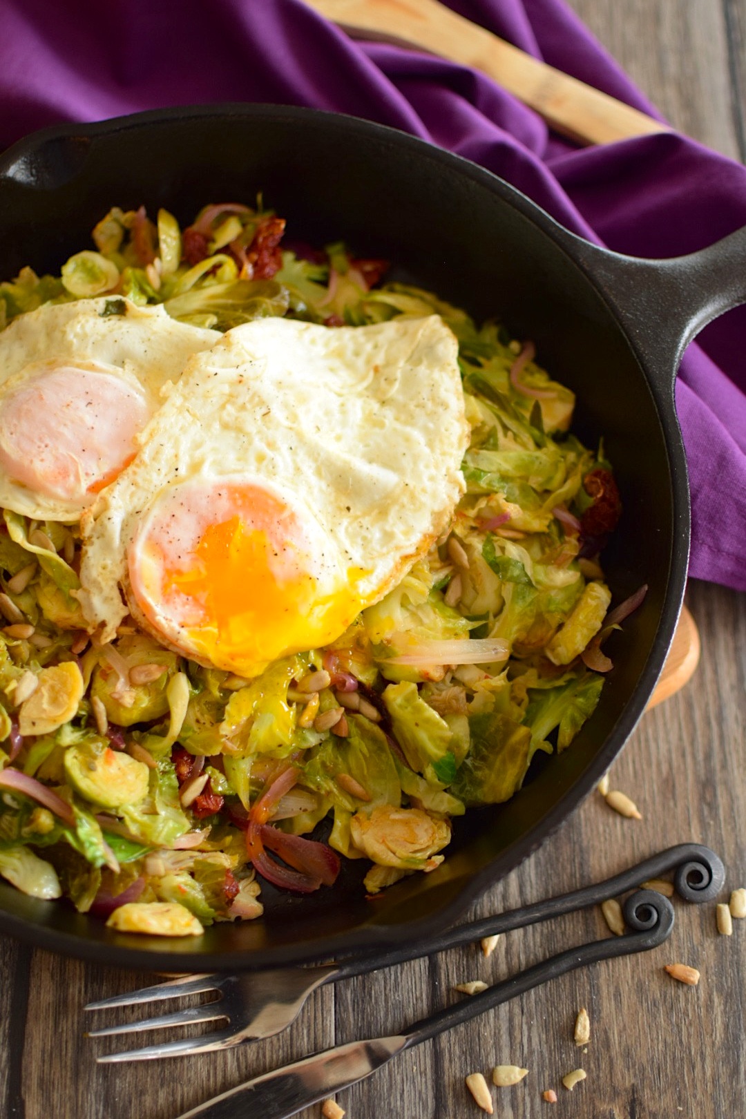 shredded brussels sprouts with eggs over easy